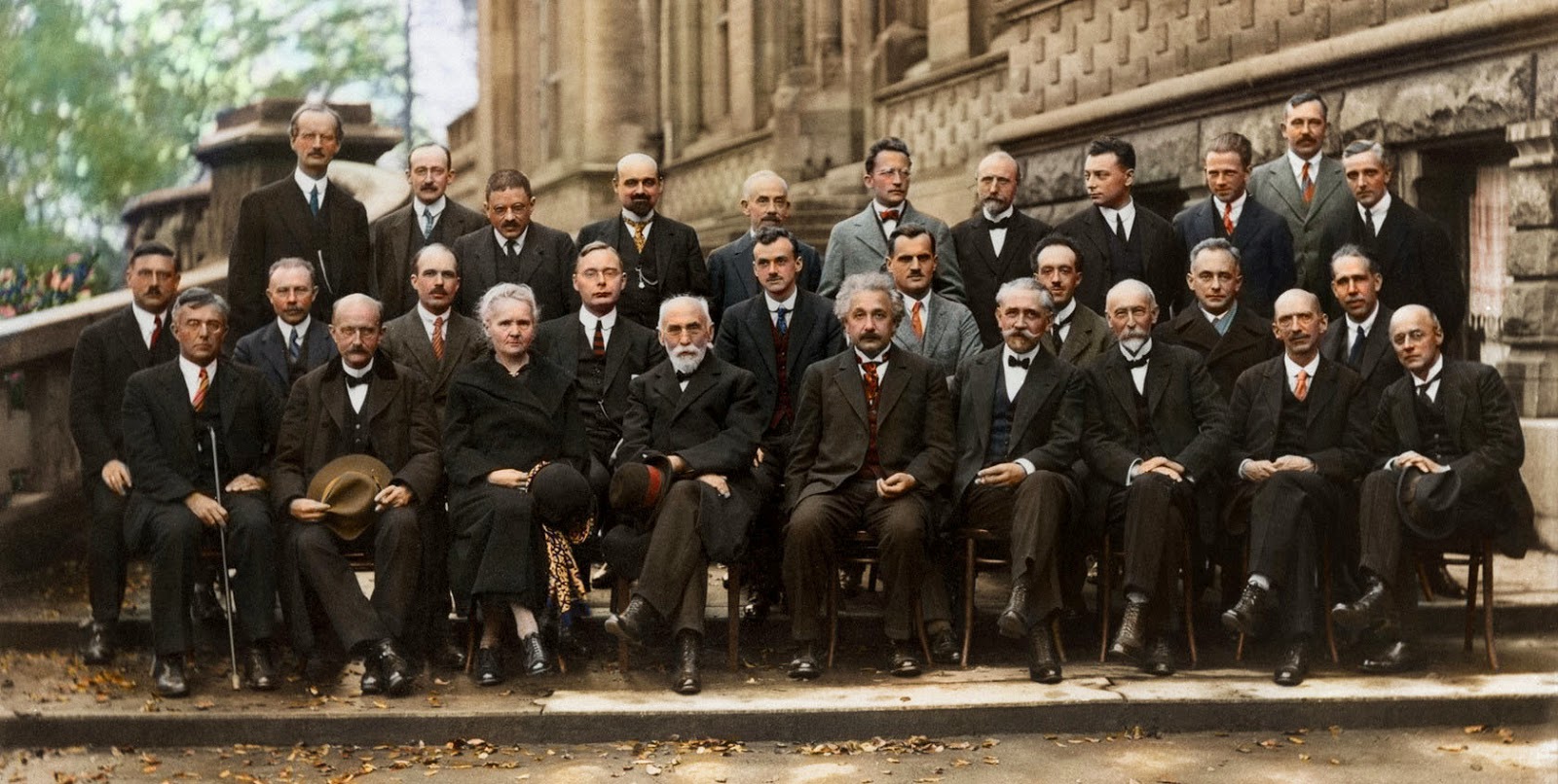 “1927 SOLVAY CONGRESS in Brussels bringing together atomic theoreticians”. In front row Max Planck second from left next to Marie Curie, Albert Einstein fifth in the second row, Nils Bohr at far right